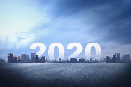 2020 on the city with a night scene background. Happy New Year 2020の写真素材