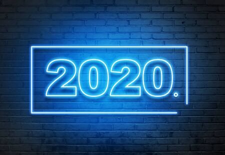 2020 from an electric lamp on the wall. Happy New Year 2020の写真素材