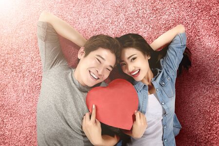 Asian couples holding the red heart. Valentines dayの写真素材