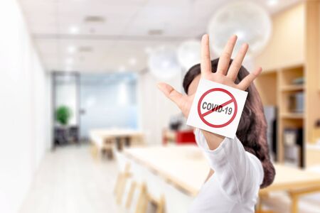 Asian woman showing stop hand gesture for coronavirus. Prevent flu disease Coronavirusの写真素材