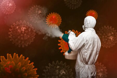 Man in a white protective suit spraying disinfectant. Prevent the spread flu disease Coronavirus