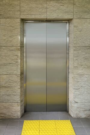 Closed lift door on the train station