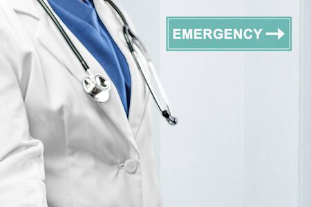 Doctor man with stethoscope stand by on the emergency room in the hospitalの写真素材