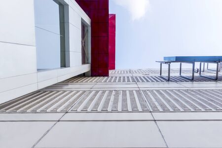Close up view of shopping mall exterior over blue sky background
