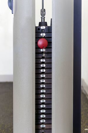 Rear view of a lat pulldown machine in the fitness gymの写真素材