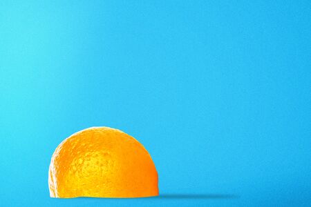 Oranges on vivid blue backgroundの写真素材