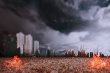 The ruined city with fires and sparks with a dark sky background