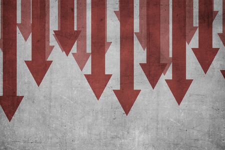 Red arrow down on the wall. Global economic crisisの写真素材