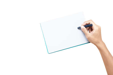 Hand with a crayon drawing in the book isolated over white background