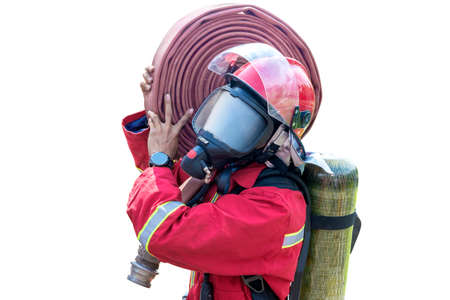 Firefighters in fire protection suit carrying a water hose isolated over white background