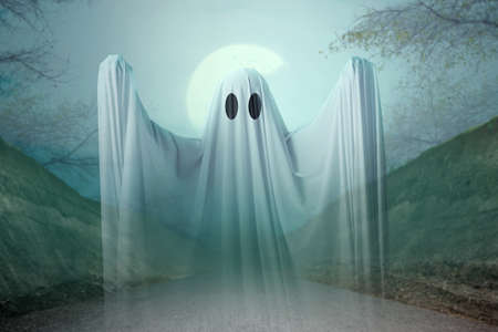 White ghost haunting with a night scene background. Halloween concept