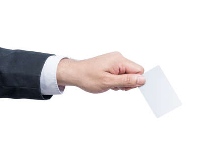 Businessman showing an empty card with his hand isolated over white backgroundの写真素材