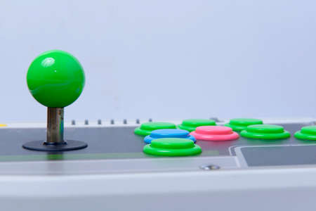 Close up view of the old joystick controller with white background