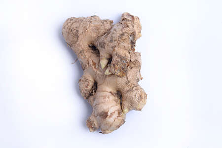 Fresh ginger isolated over white backgroundの写真素材