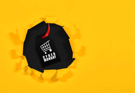 A ripped paper showing Cyber Monday text. Cyber Monday conceptの写真素材