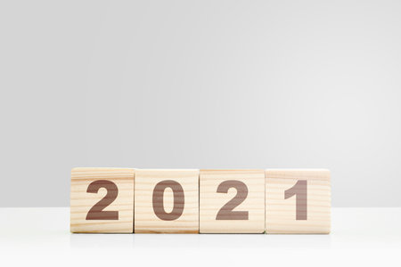 2021 on the wooden cube. Happy New Year 2021