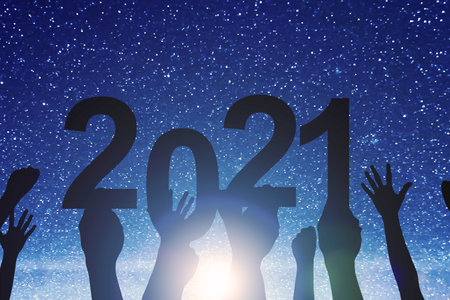 Silhouette of business people celebrating the new year. Happy New Year 2021