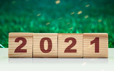 2021 on the wooden cube. Happy New Year 2021の写真素材