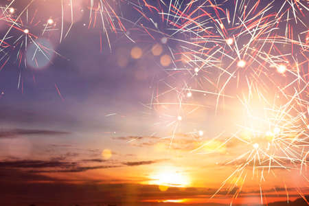 Fireworks with sunset sky