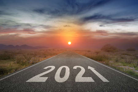 2021 on the street with a sunrise sky background. Happy New Year 2021の写真素材