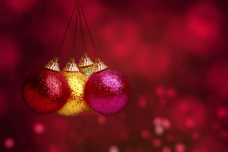 Colorful Christmas ball hanging with a colored background. Merry Christmasの写真素材