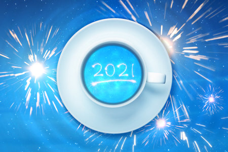 A glass of coffee showing 2021 with a night scene background. Happy New Year 2021の写真素材