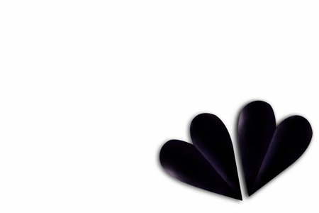 Black heart isolated over white backgroundの写真素材