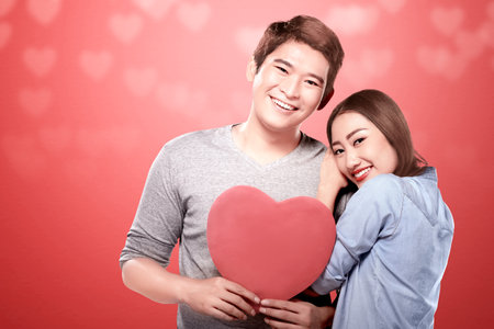 Asian couples holding the red heart. Valentines dayの写真素材