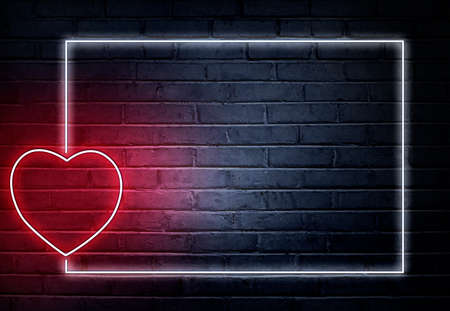 Heart shape from colored neon lights on the wall. Valentines day