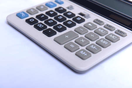Calculator isolated over white backgroundの写真素材