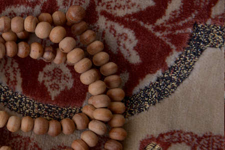 Prayer beads on the prayer rug