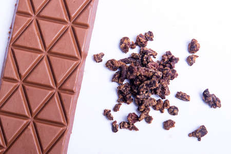 Chocolate bar isolated over white backgroundの写真素材