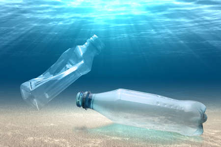 Underwater view with a plastic bottle on the ocean. Plastic pollution