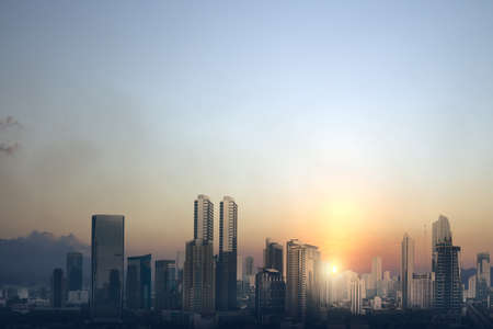 Skyscrapers and modern buildings with the sunset scene backgroundの写真素材