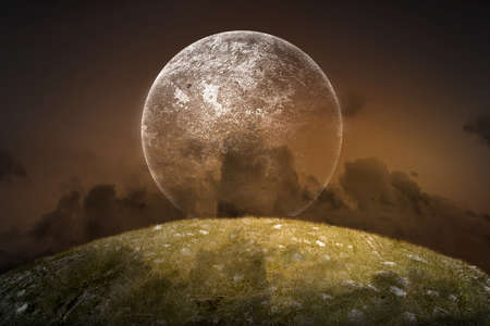 Dramatic view of the dark cloud with full moon on the skyの写真素材