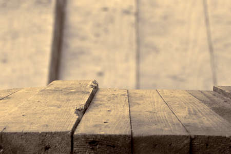 Wooden table with blurred background