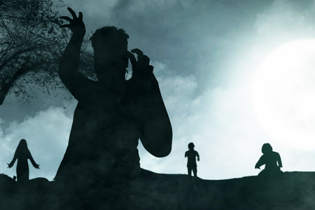 Silhouette of scary zombies with blood and wound on his body standing with a night scene backgroundの写真素材