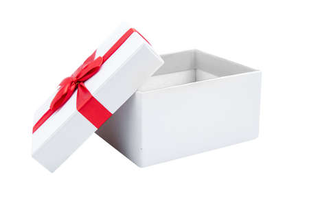 Opened white gift box with red ribbon isolated over white background