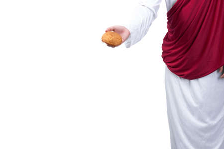 Jesus Christ with open palm giving food isolated over white backgroundの写真素材