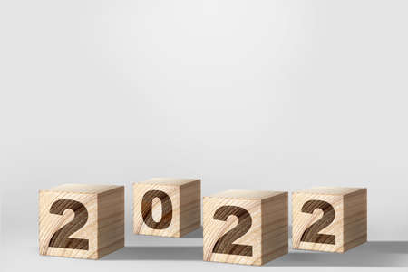 2022 on the wooden cube. Happy New Year 2022