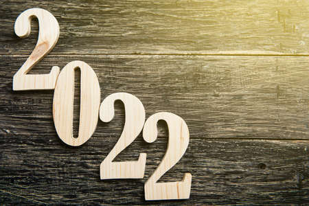 2022 on wooden background. Happy New Year 2022の写真素材