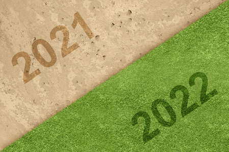 The difference between land in 2021 and earth in 2022. Happy New Year 2022の写真素材