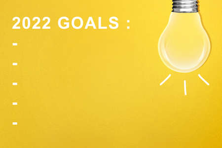 Empty list for 2022 goals with a colored background. Goals of 2022. Happy New Year 2022の写真素材