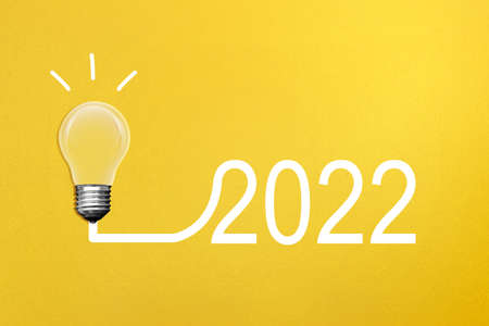 2022 with the light bulb. Happy New Year 2022