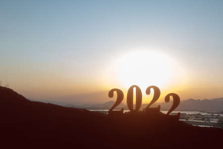 Silhouette of 2022 with a sunrise sky background. Happy New Year 2022の写真素材
