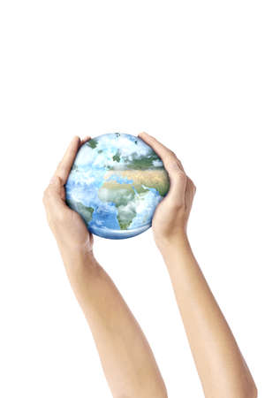 Hand holding earth isolated over white backgroundの写真素材