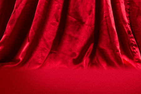Closeup view of the red curtain for backgroundの写真素材