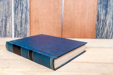 Closeup view of the book on wooden tableの写真素材