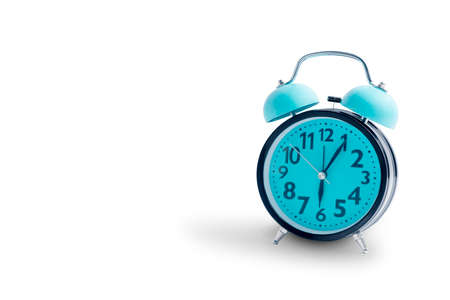 Blue alarm clock isolated over white backgroundの写真素材