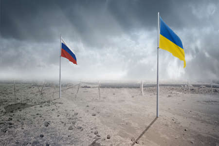 Ukraine flag and Russian flag waving with dramatic sky backgroundの写真素材